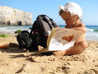 baby reading Baby Signs book