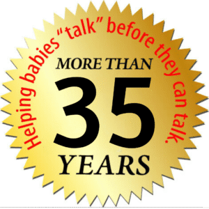 Gold badge with text “Helping babies 'talk' before they can talk – More than 35 years”