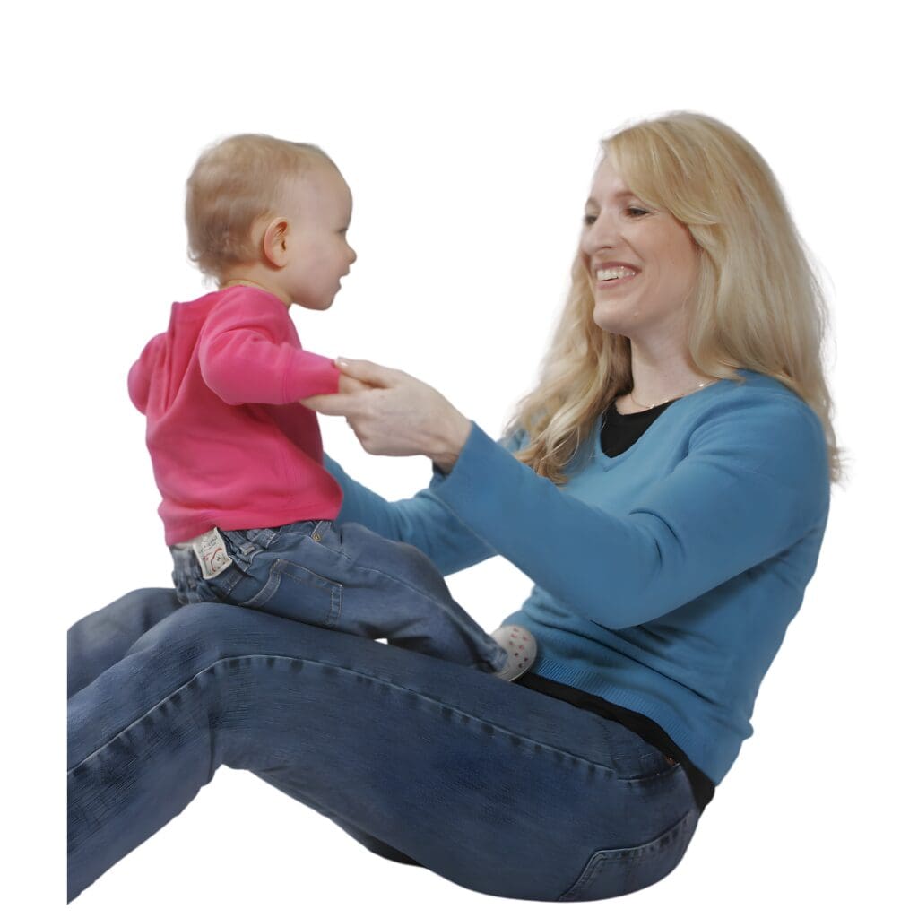 Mother interacting with baby during an early development activity