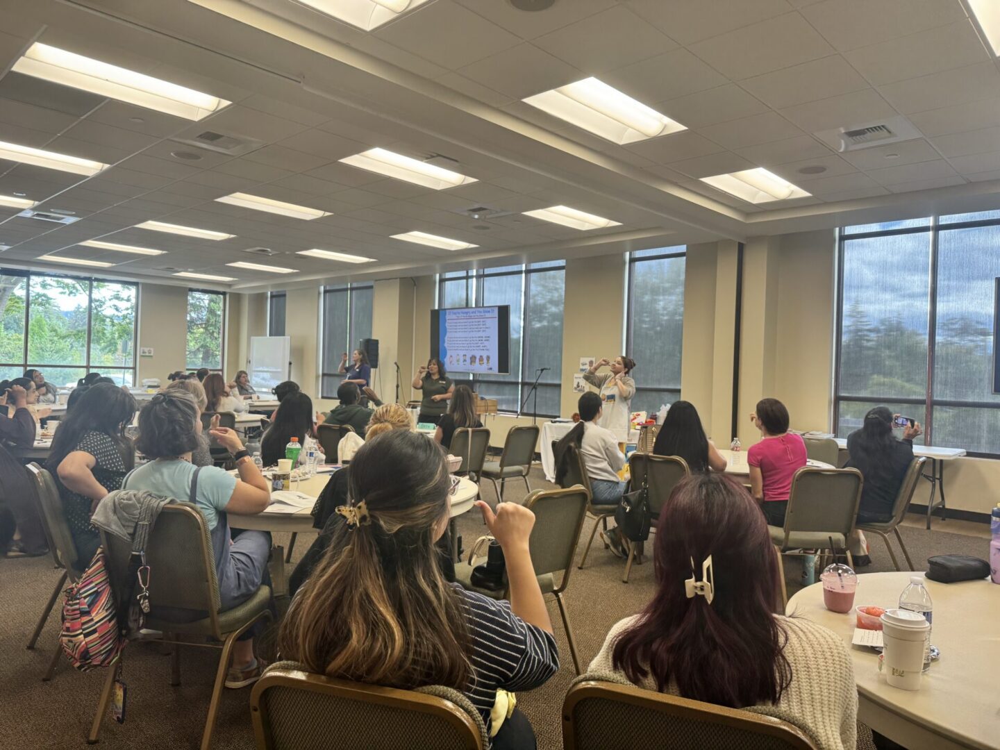 Professionals practicing Baby Signs® during a workshop in Oregon